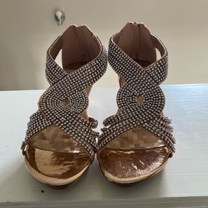 Shoes color/rose gold size =6.5 new never worn.